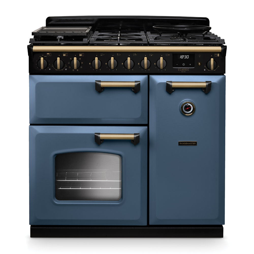 Rangemaster Classic Deluxe 90 Dual Fuel range cooker in stone blue with antique brass trim