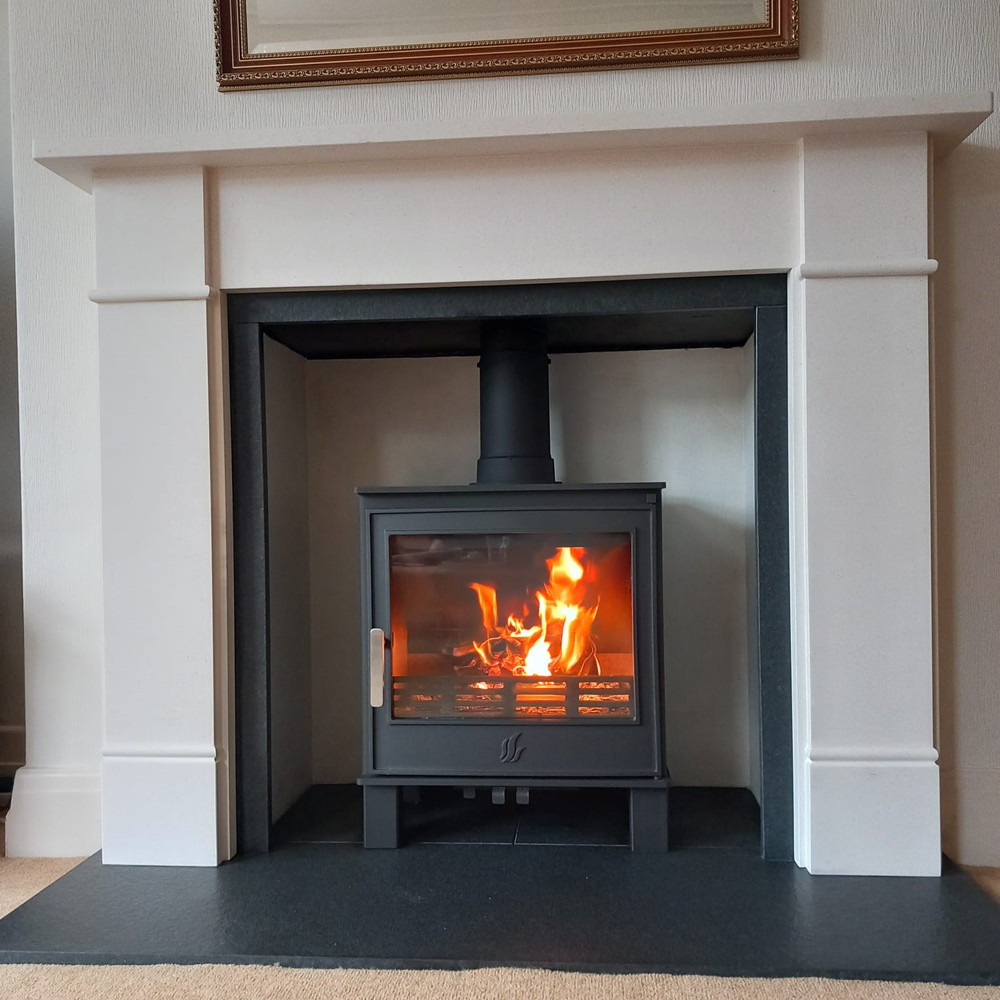 ACR Buxton multifuel stove installed with Brompton mantel